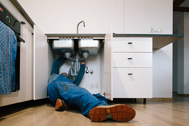Professional Drain Cleaning technician working in Greendale, IN